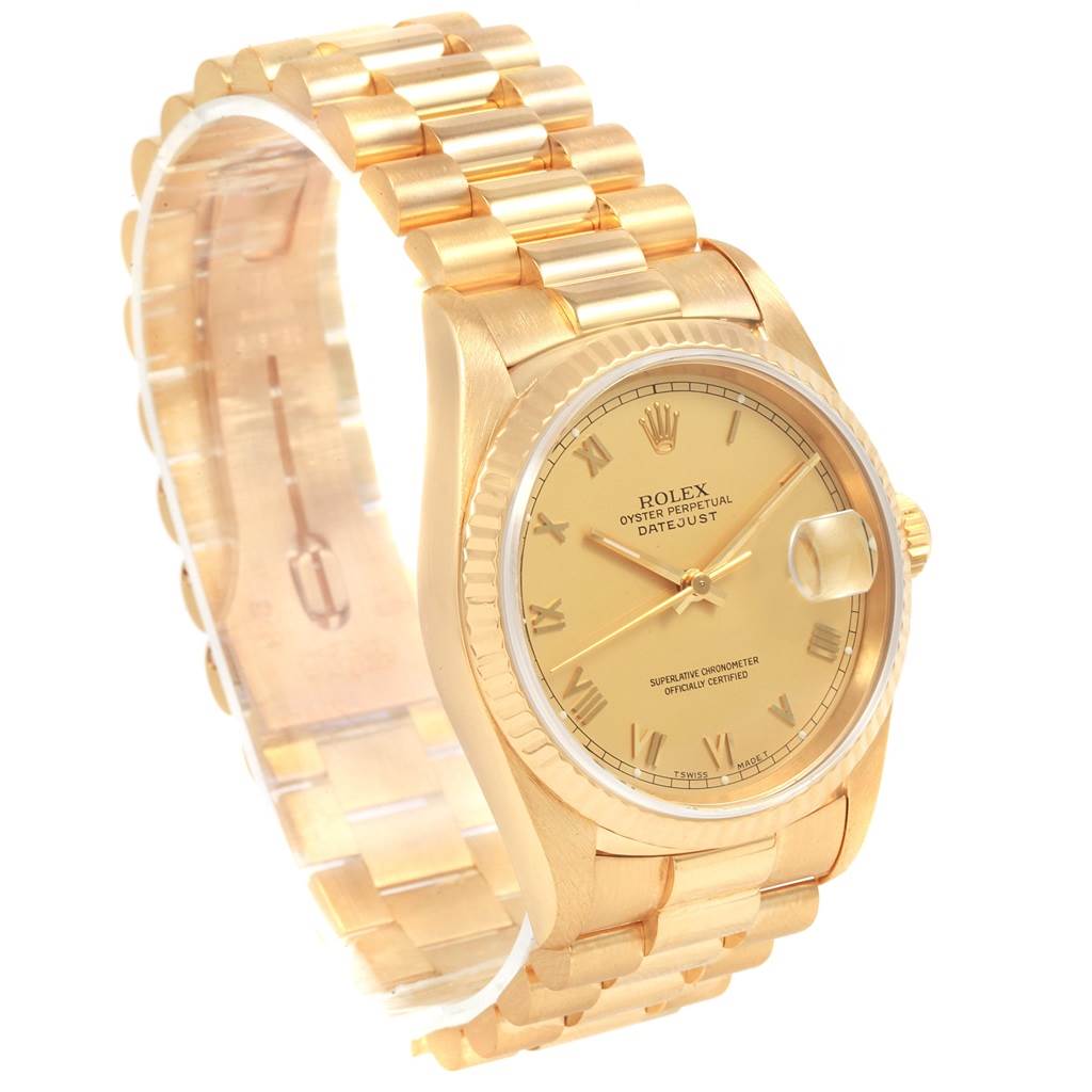 This image shows a Rolex Date 16238 Men's Yellow Gold Champagne Dial 16238 Men's Yellow Gold Champagne Dialjust watch at a three-quarter angle, highlighting the bracelet, dial, and side profile.