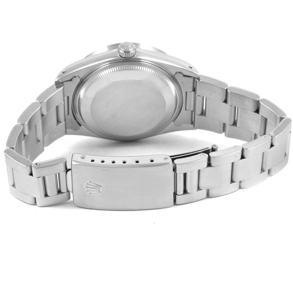 This is a rear view of a Rolex Date 15210 Men's Stainless Steel Silver Dial 15210 Men's Stainless Steel Silver Dial model showing the case back, crown, and closed clasp with the Oyster bracelet.