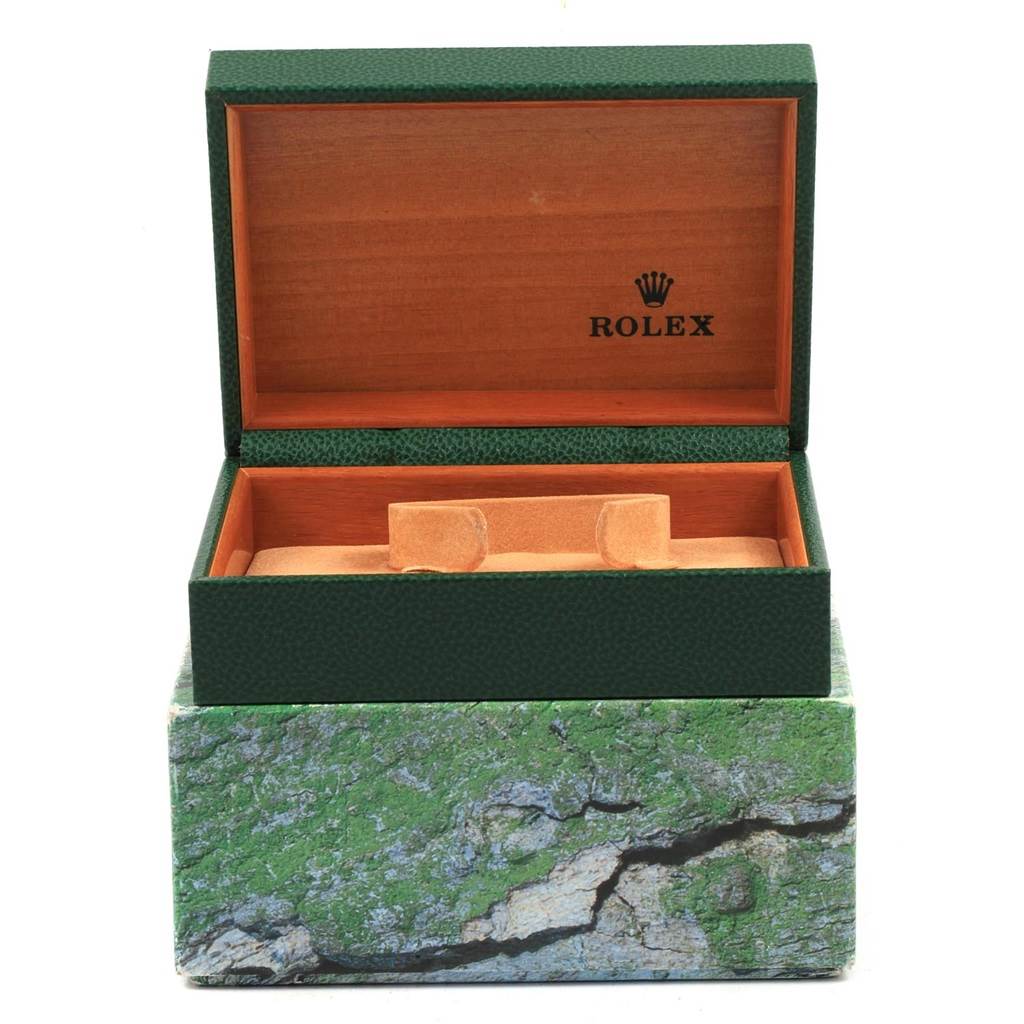 The image shows a green and brown open watch box for a Rolex Date 15210 Men's Stainless Steel Silver Dial 15210 Men's Stainless Steel Silver Dial model, displaying the interior storage slots.
