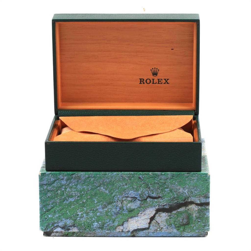 The image shows an open Rolex watch box for the Date model, with the pillow and cover inside.