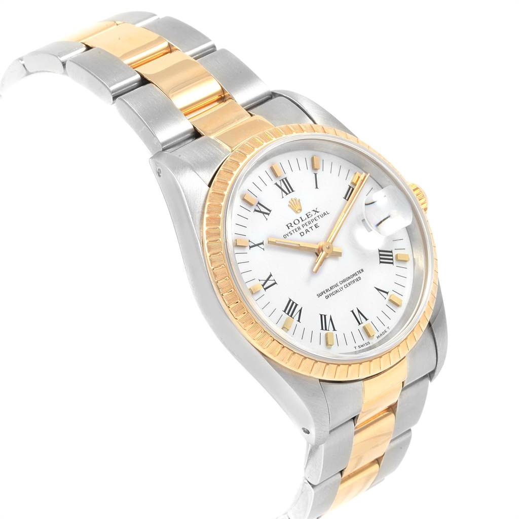 The image shows a tilted view of a Rolex Date 15223 Men's Steel and Gold (two tone) White Dial 15223 Men's Steel and Gold (two tone) White Dial model, displaying its face, bezel, and two-tone metal bracelet.
