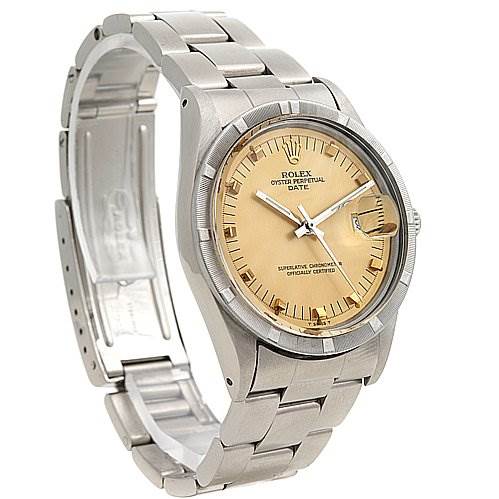 The image shows a Rolex Date 15010 Men
s Stainless Steel Champagne Dial 15010 Men
s Stainless Steel Champagne Dial model watch at a three-quarter angle, displaying the face, bezel, and part of the bracelet.