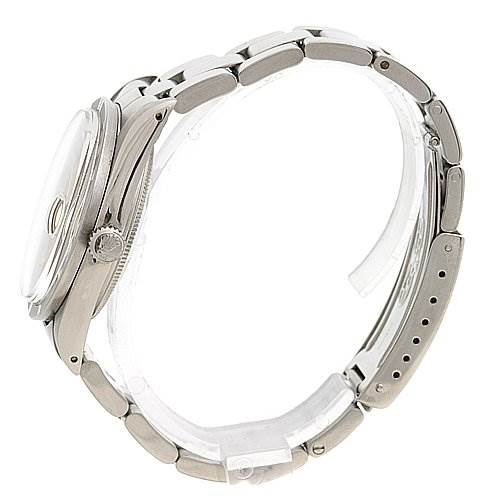 The image shows a Rolex Date 15010 Men
s Stainless Steel Champagne Dial 15010 Men
s Stainless Steel Champagne Dial model watch from a side angle, highlighting the bracelet and crown.