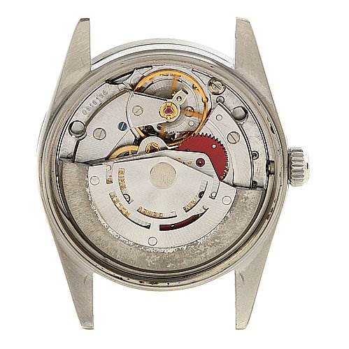 This is a view of the movement and internal mechanism of a Rolex Date 15010 Men
s Stainless Steel Champagne Dial 15010 Men
s Stainless Steel Champagne Dial model watch.