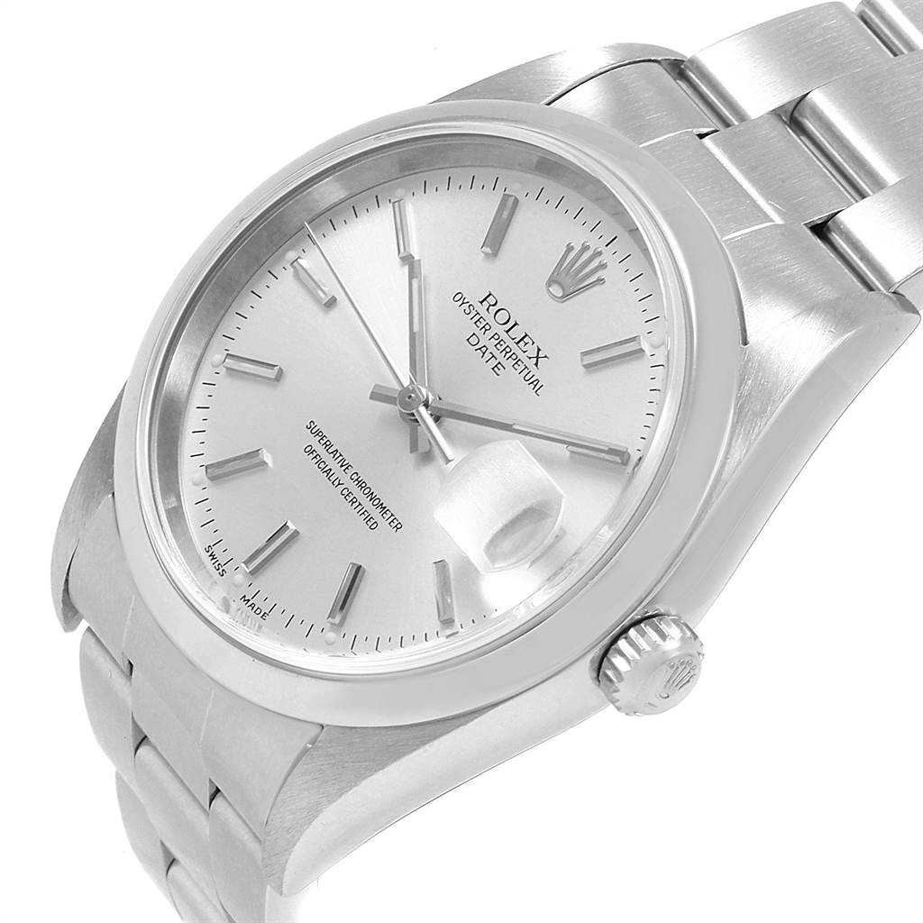 The image shows a detailed angle of a Rolex Date 15200 Men's Stainless Steel Silver Dial 15200 Men's Stainless Steel Silver Dial watch, including the dial, crown, and part of the bracelet.