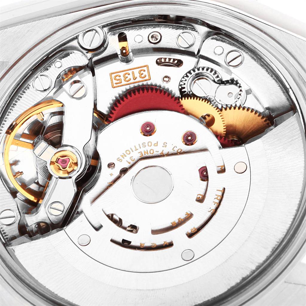 This is a close-up view of the internal mechanism of a Rolex Date 15200 Men's Stainless Steel Silver Dial 15200 Men's Stainless Steel Silver Dial model watch, showing gears and movement parts.