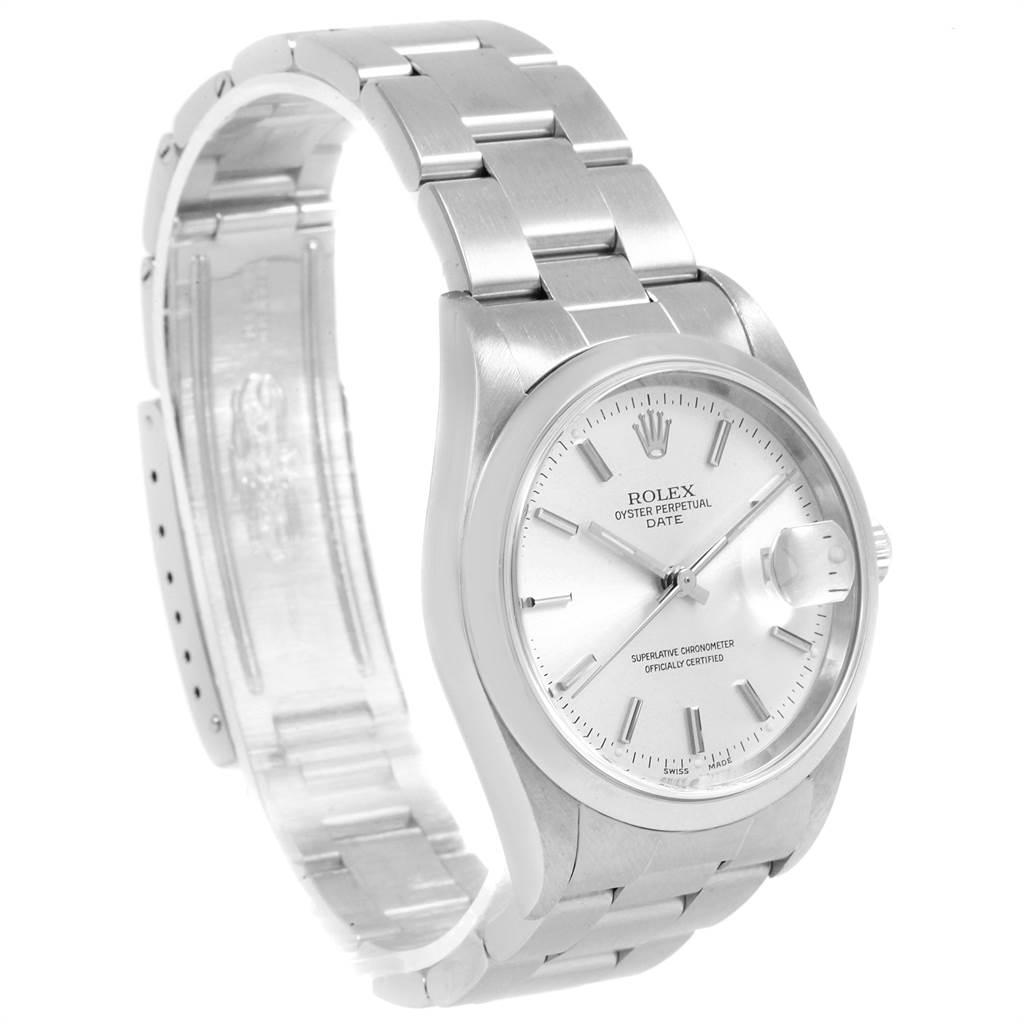 The image shows a Rolex Oyster Perpetual Date watch from a front angle, highlighting the dial and part of the bracelet.