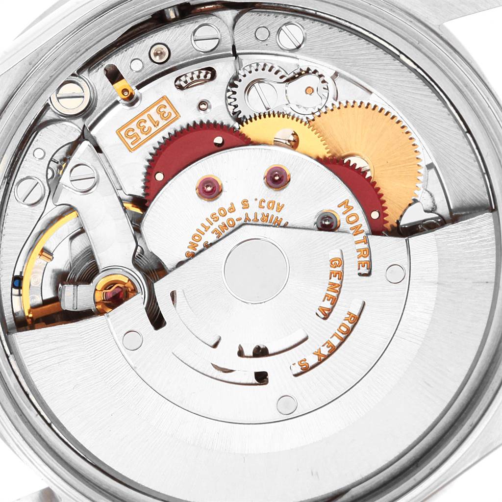 The image shows an internal view of the Rolex Date 15210 Men's Stainless Steel Black Dial 15210 Men's Stainless Steel Black Dial model watch, highlighting its intricate movement mechanism.