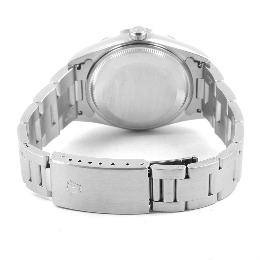 The image shows the back view of a Rolex Date 15210 Men's Stainless Steel Silver Dial 15210 Men's Stainless Steel Silver Dial watch, highlighting the case back and bracelet with the clasp.