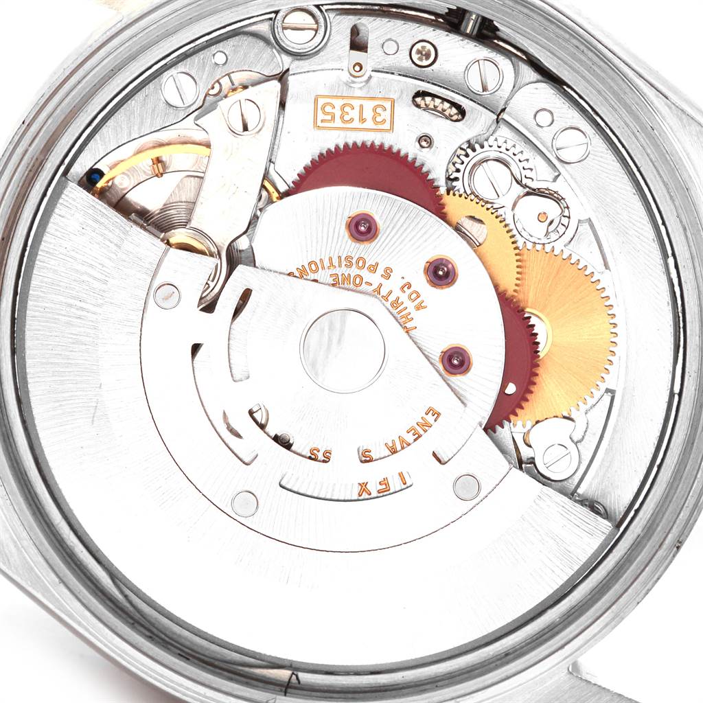 This image shows the internal mechanical movement of a Rolex Date 15210 Men's Stainless Steel Silver Dial 15210 Men's Stainless Steel Silver Dial model watch at a close-up angle.