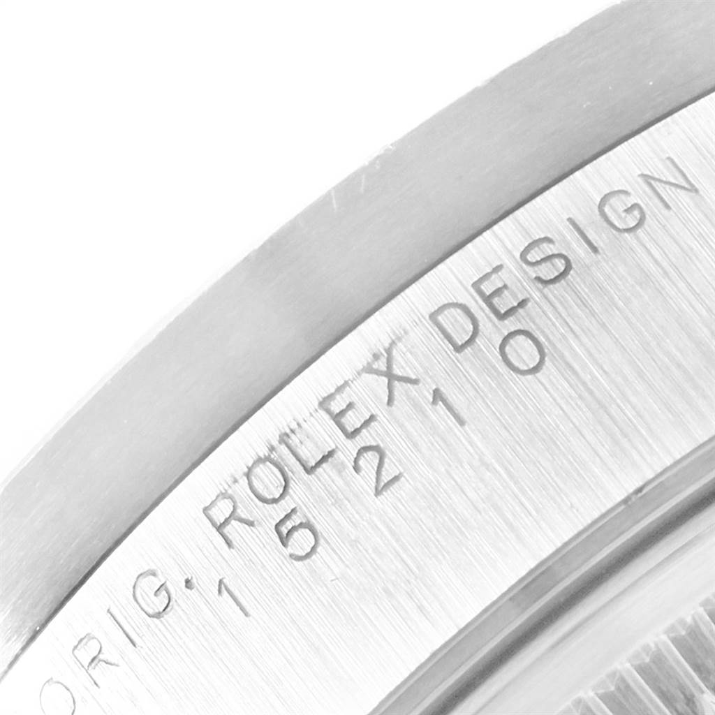 The image shows a close-up view of the inscription on the bezel of a Rolex Date 15210 Men's Stainless Steel Silver Dial 15210 Men's Stainless Steel Silver Dial model watch.