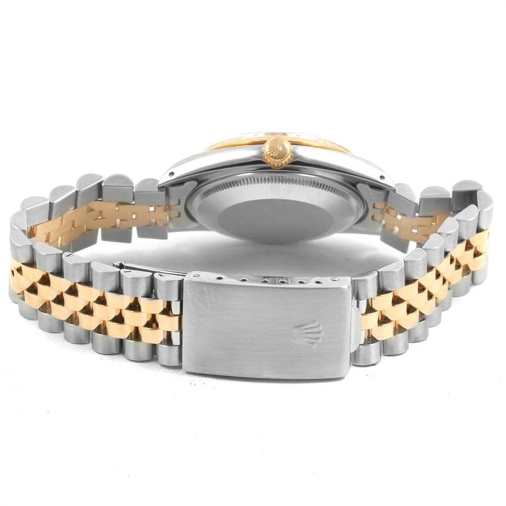 The image shows the back and bracelet of a Rolex Date 15053 Men's Steel and Gold (two tone) Champagne Dial 15053 Men's Steel and Gold (two tone) Champagne Dial model watch, displaying its bicolor metal design and clasp logo.