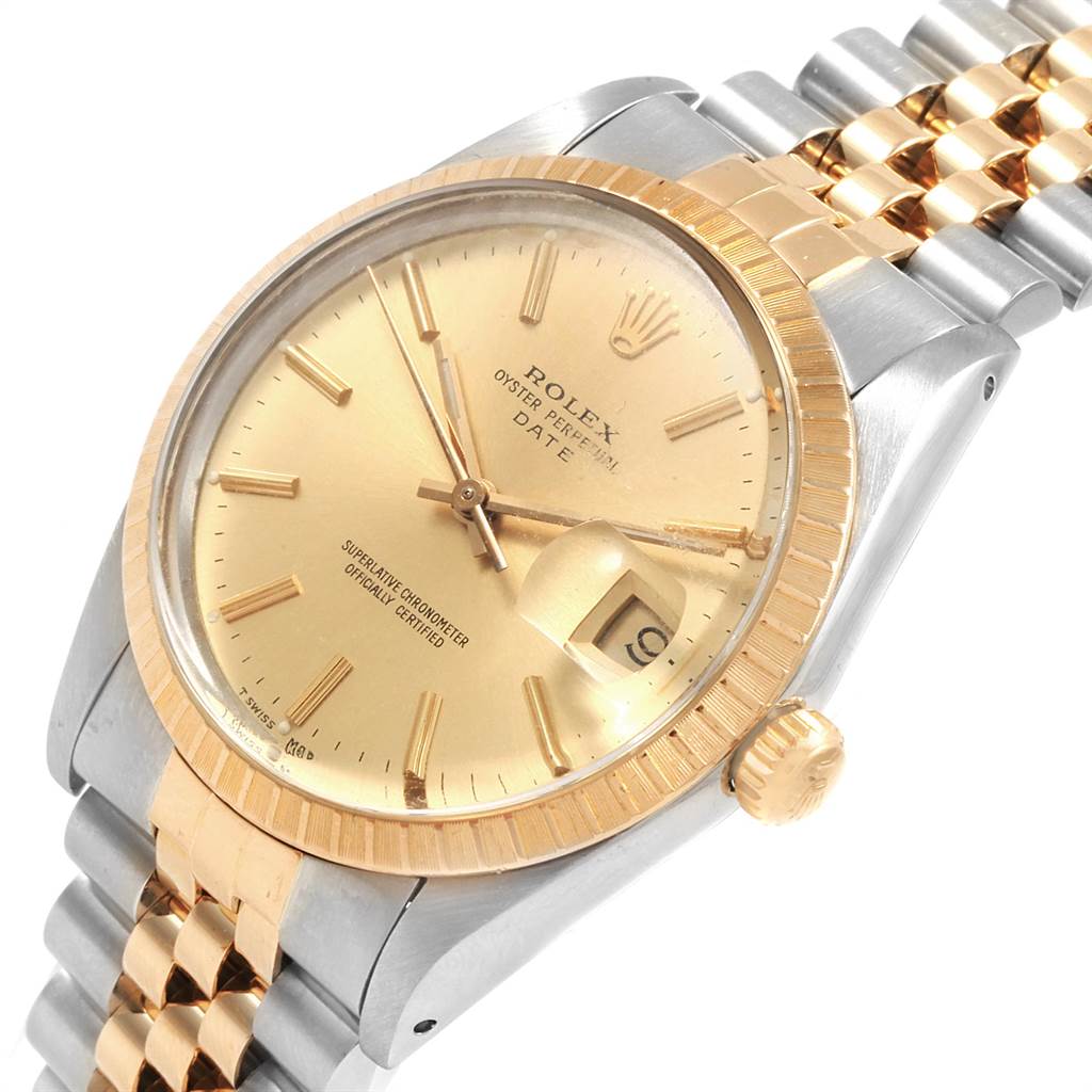 The Rolex Date 15053 Men's Steel and Gold (two tone) Champagne Dial 15053 Men's Steel and Gold (two tone) Champagne Dial model watch is shown from an upper angle highlighting the dial, bezel, crown, and two-tone bracelet.