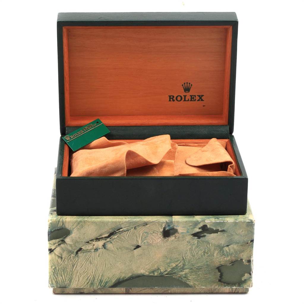 The image shows an open Rolex Date 15053 Men's Steel and Gold (two tone) Champagne Dial 15053 Men's Steel and Gold (two tone) Champagne Dial model watch box with a brown interior and cloth, viewed from the front.