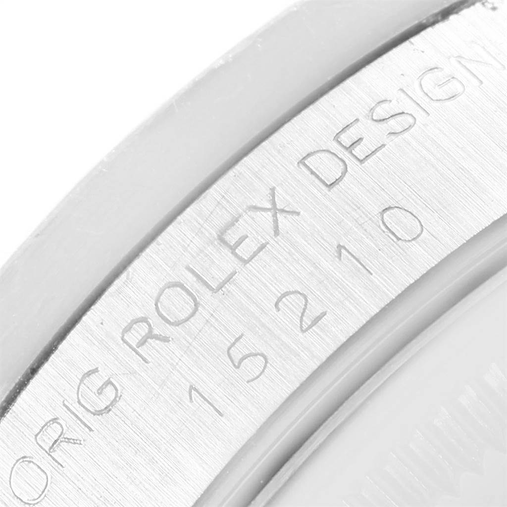 This close-up image shows the engraved inner bezel of the Rolex Date 15210 Men's Stainless Steel White Dial 15210 Men's Stainless Steel White Dial watch model.