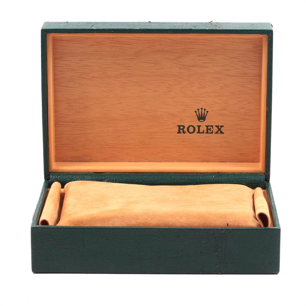 The image displays a Rolex watch box, open to reveal the interior, without the Date model watch visible.