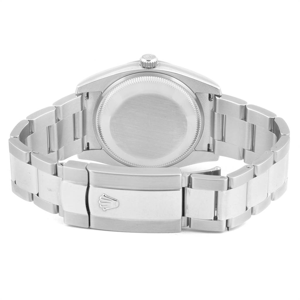 The image shows the back case of a Rolex Date 115200 Men's Stainless Steel Pink Dial 115200 Men's Stainless Steel Pink Dial watch, including the bracelet and clasp.