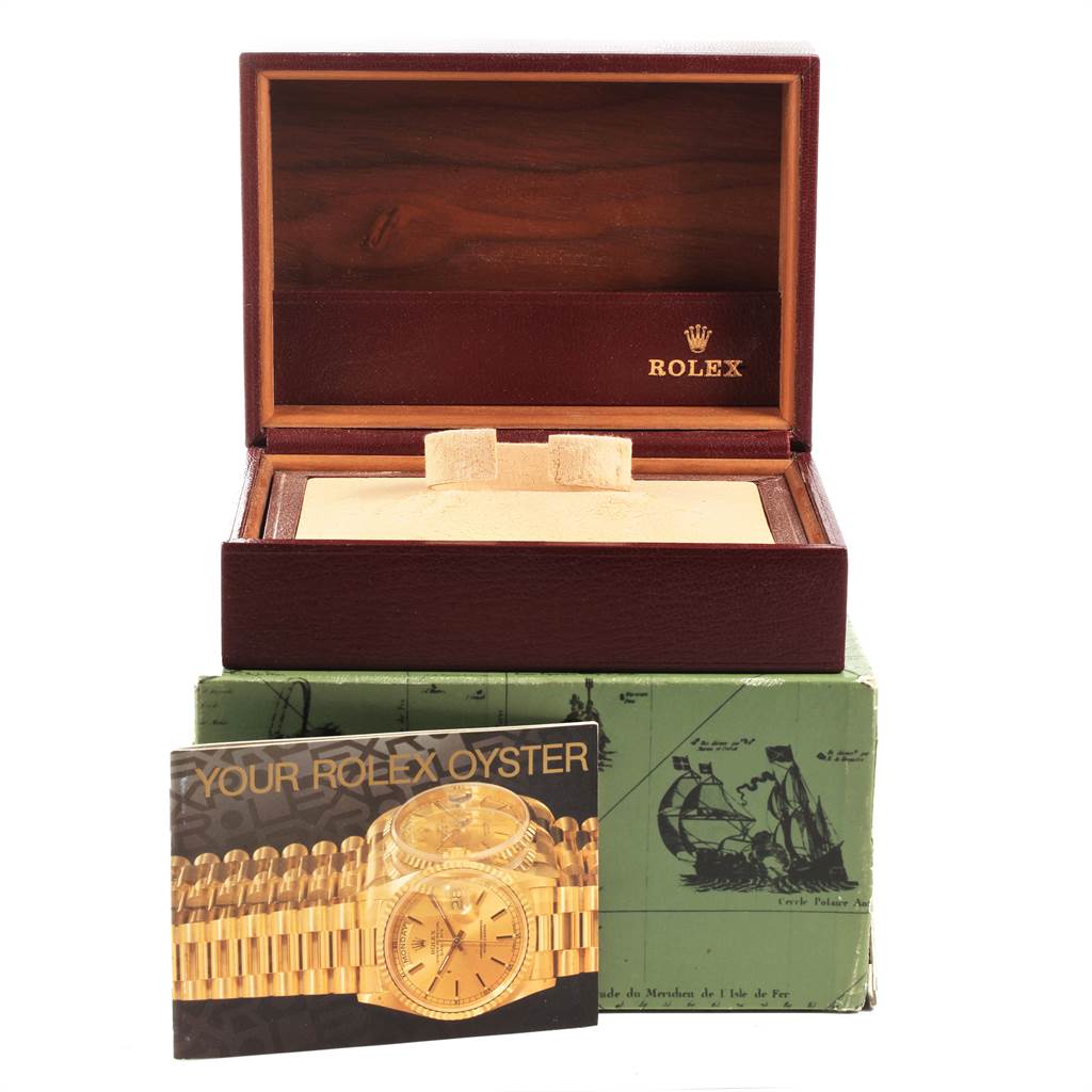 The image shows a Rolex Date 16238 Men's Yellow Gold Champagne Dial 16238 Men's Yellow Gold Champagne Dial model watch box with an open lid and an accompanying booklet in the foreground.