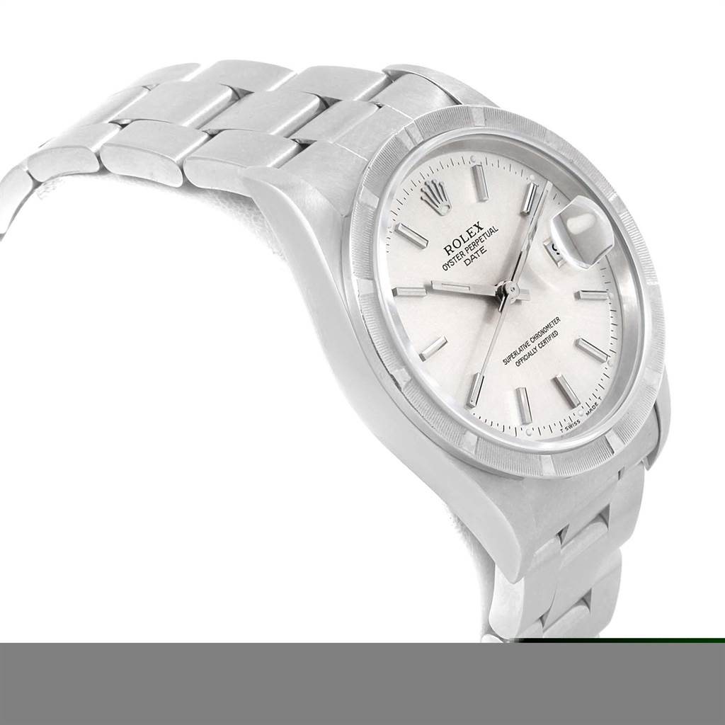 The image shows a side view of a Rolex Date 15210 Men's Stainless Steel Silver Dial 15210 Men's Stainless Steel Silver Dial watch, highlighting the dial, bezel, and part of the bracelet.