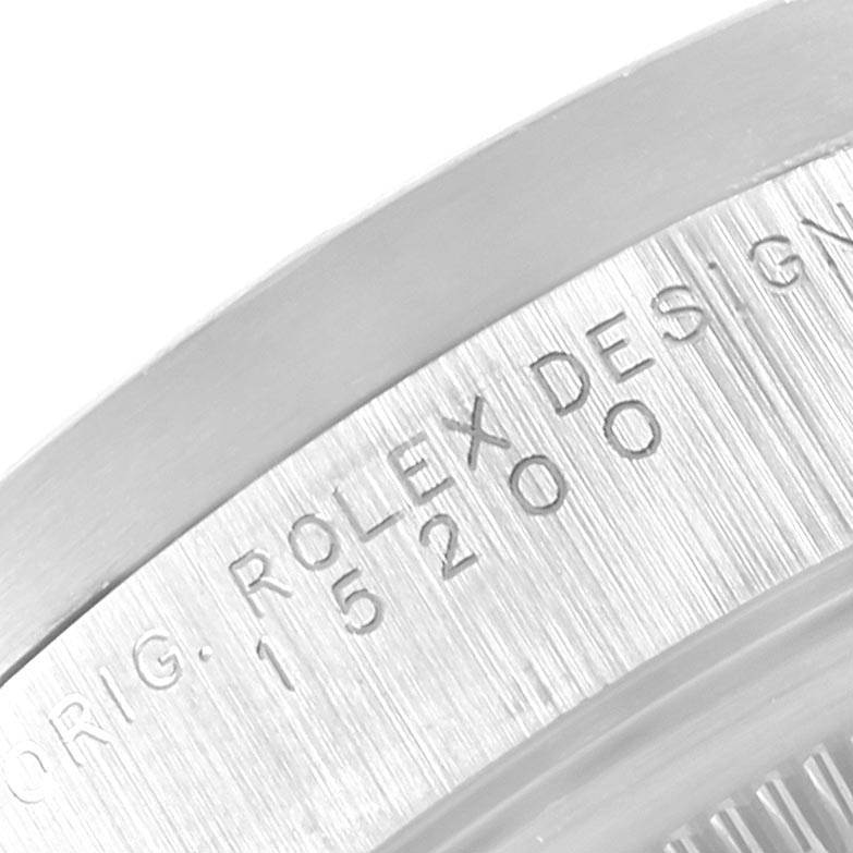 This close-up angle shows the engraved model number on the case of a Rolex Date 15210 Men's Stainless Steel White Dial 15210 Men's Stainless Steel White Dial watch.