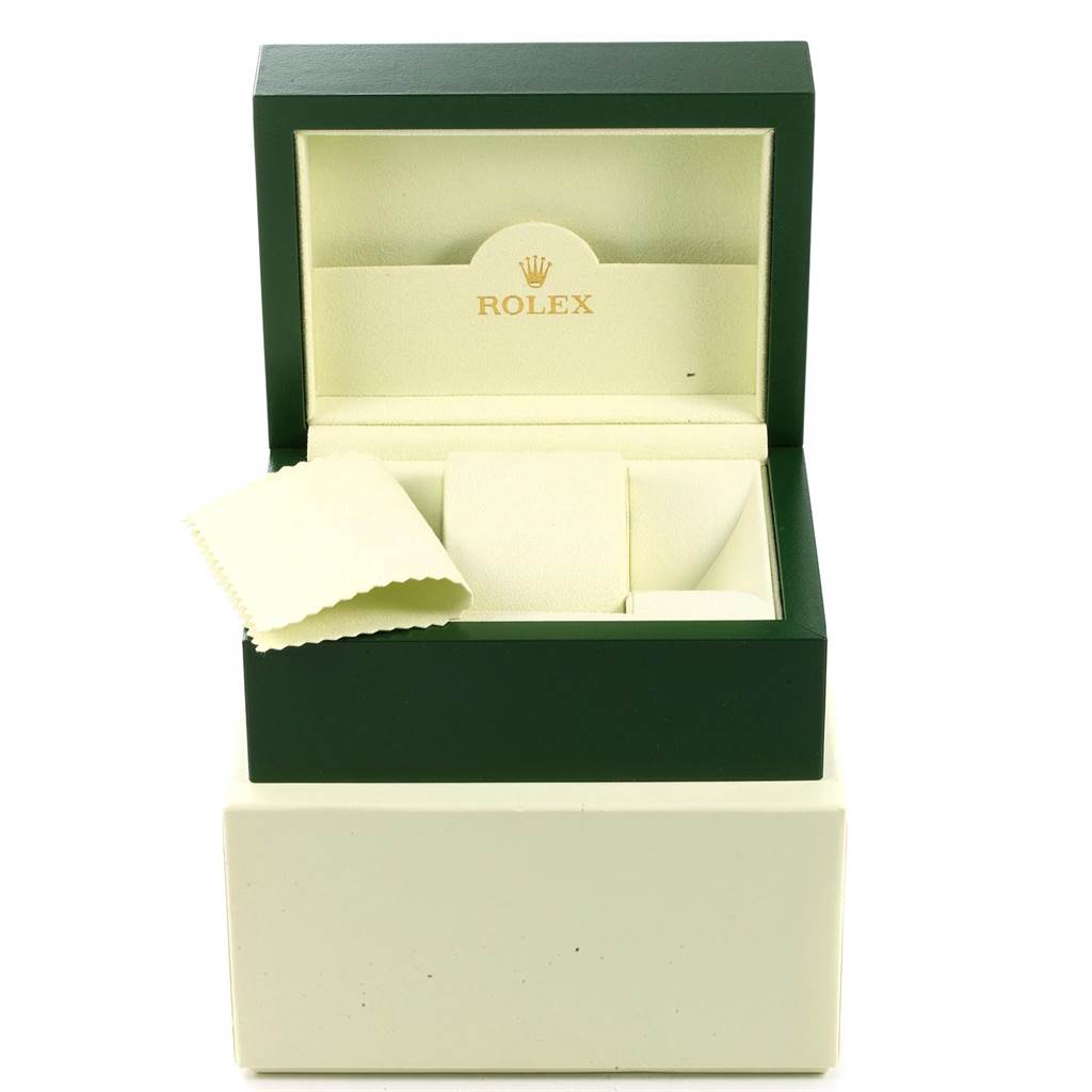 The image shows an open Rolex Date 15210 Men's Stainless Steel White Dial 15210 Men's Stainless Steel White Dial model watch box with a polishing cloth and cushion inside.