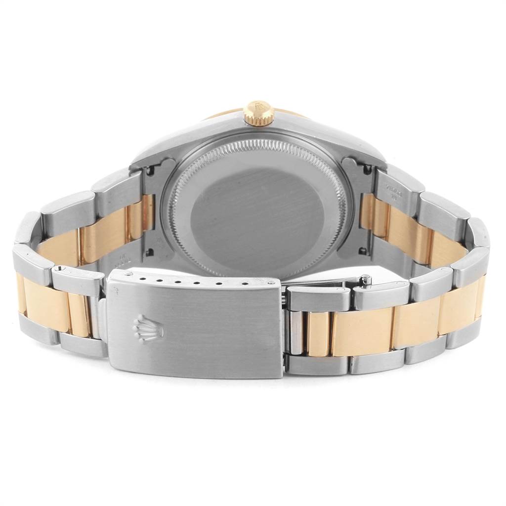 This image shows the back and strap of a Rolex Date 15223 Men's Steel and Gold (two tone) Blue Dial 15223 Men's Steel and Gold (two tone) Blue Dial model watch, including the clasp and case back.