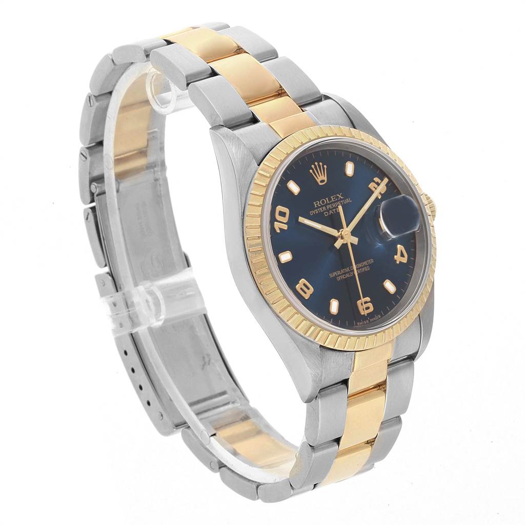 The image shows a side angle view of a Rolex Date 15223 Men's Steel and Gold (two tone) Blue Dial 15223 Men's Steel and Gold (two tone) Blue Dial model watch, featuring the dial, bezel, and bracelet.