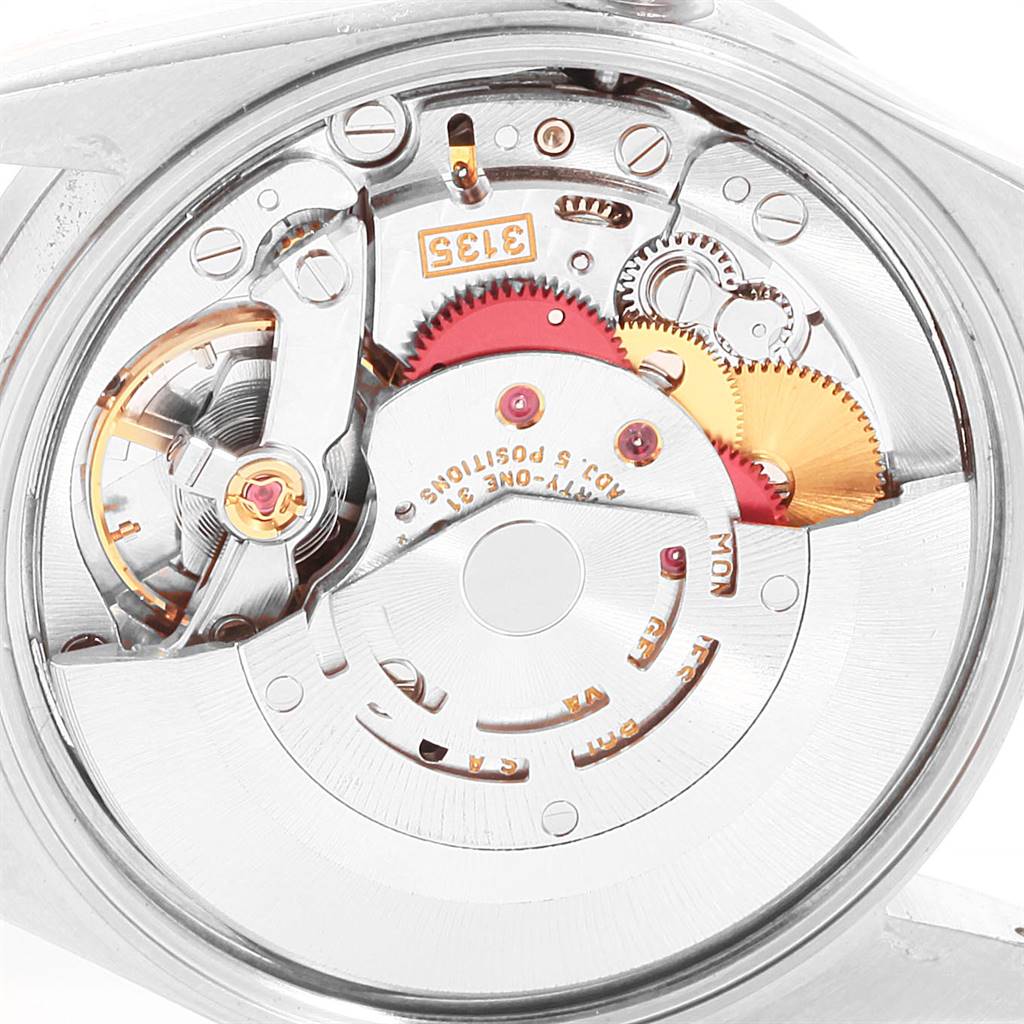 This image shows the internal mechanical movement of a Rolex Date 15210 Men's Stainless Steel White Dial 15210 Men's Stainless Steel White Dial model watch viewed from the back.