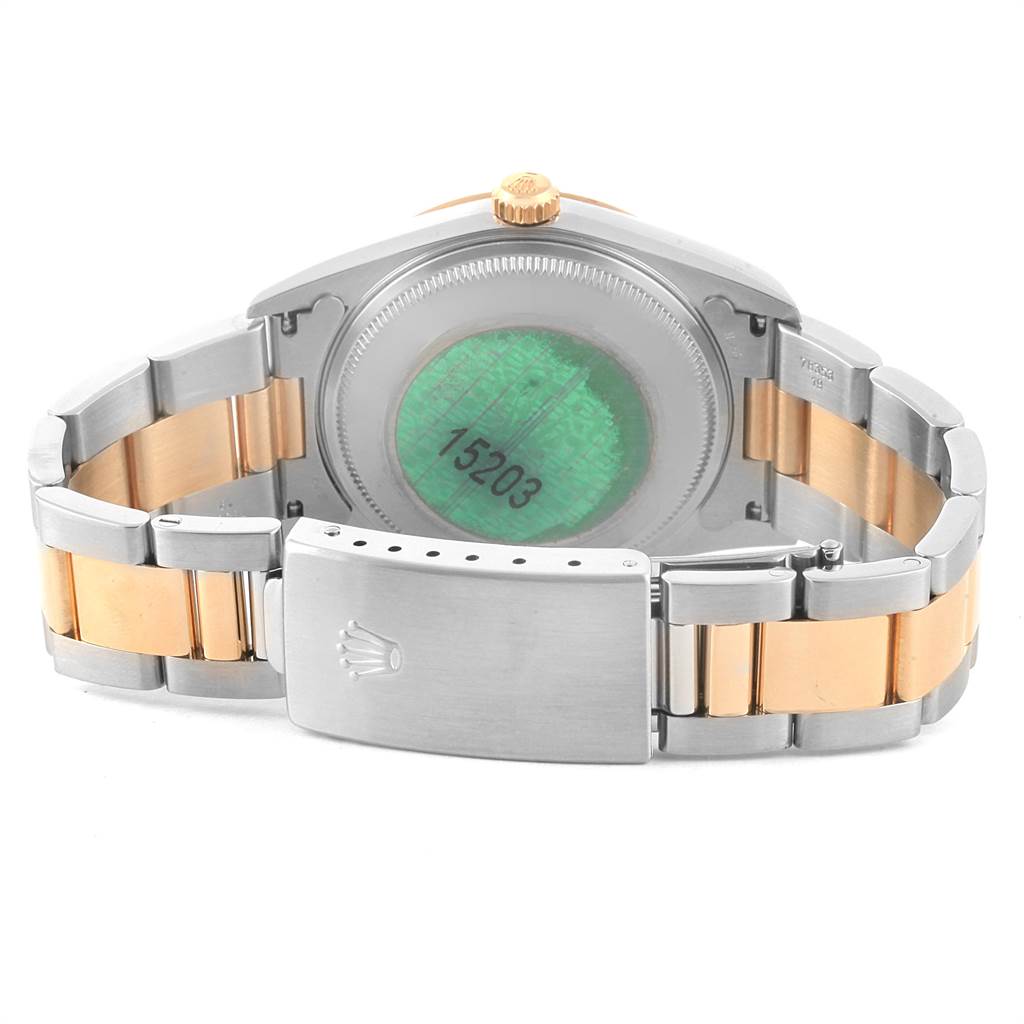 The image shows the back case, crown, and metal bracelet of the Rolex Date 15203 Men's Steel and Gold (two tone) Grey Dial 15203 Men's Steel and Gold (two tone) Grey Dial model watch.