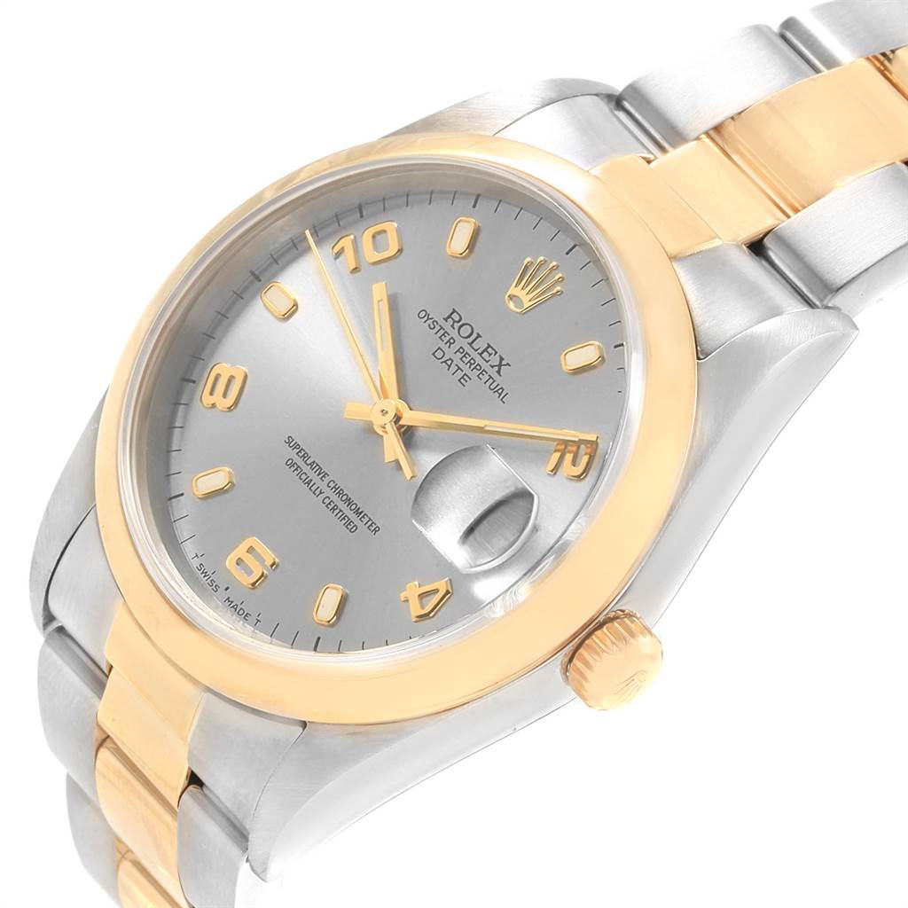 The image shows a close-up, angled view of the Rolex Date 15203 Men's Steel and Gold (two tone) Grey Dial 15203 Men's Steel and Gold (two tone) Grey Dial model watch, highlighting its dial, bezel, and part of the bracelet.