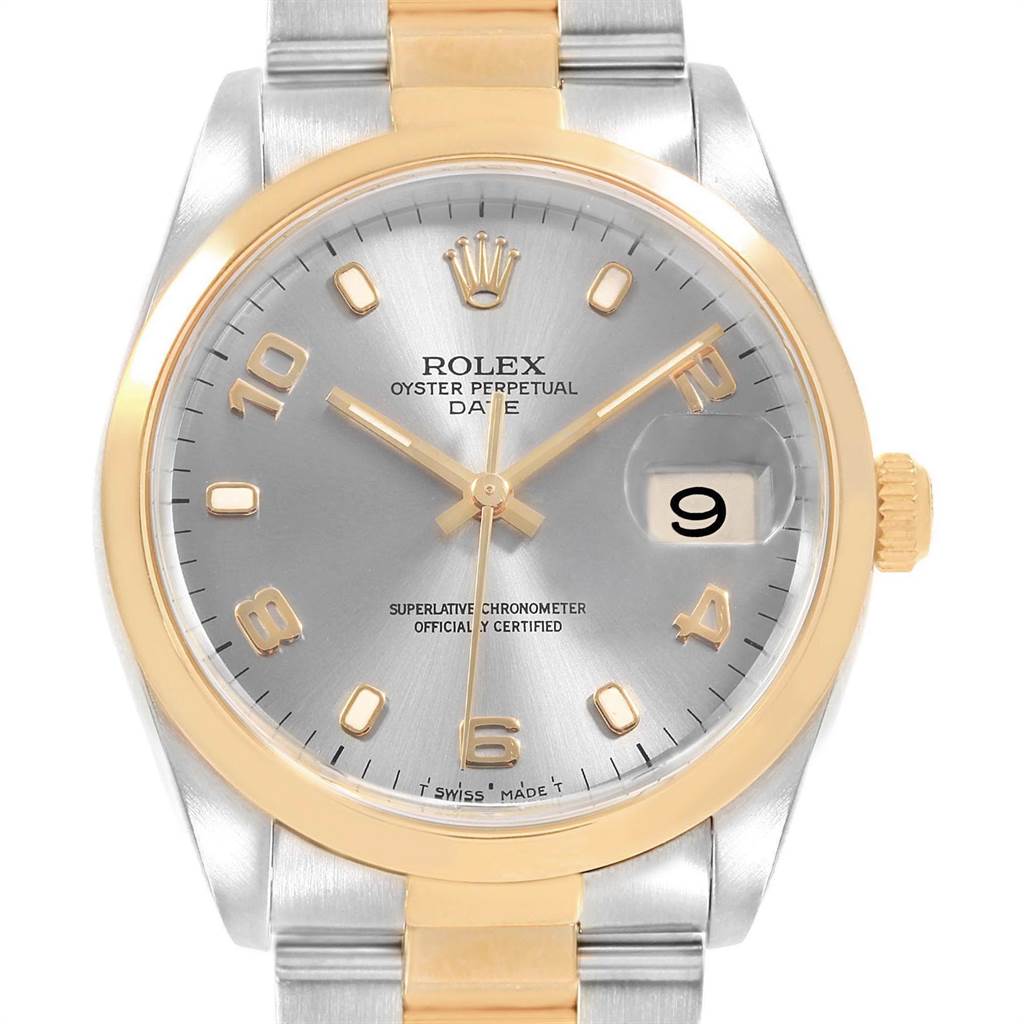 The Rolex Date 15203 Men's Steel and Gold (two tone) Grey Dial 15203 Men's Steel and Gold (two tone) Grey Dial model watch is shown from the front, highlighting its dial, hands, bezel, crown, and part of the bracelet.