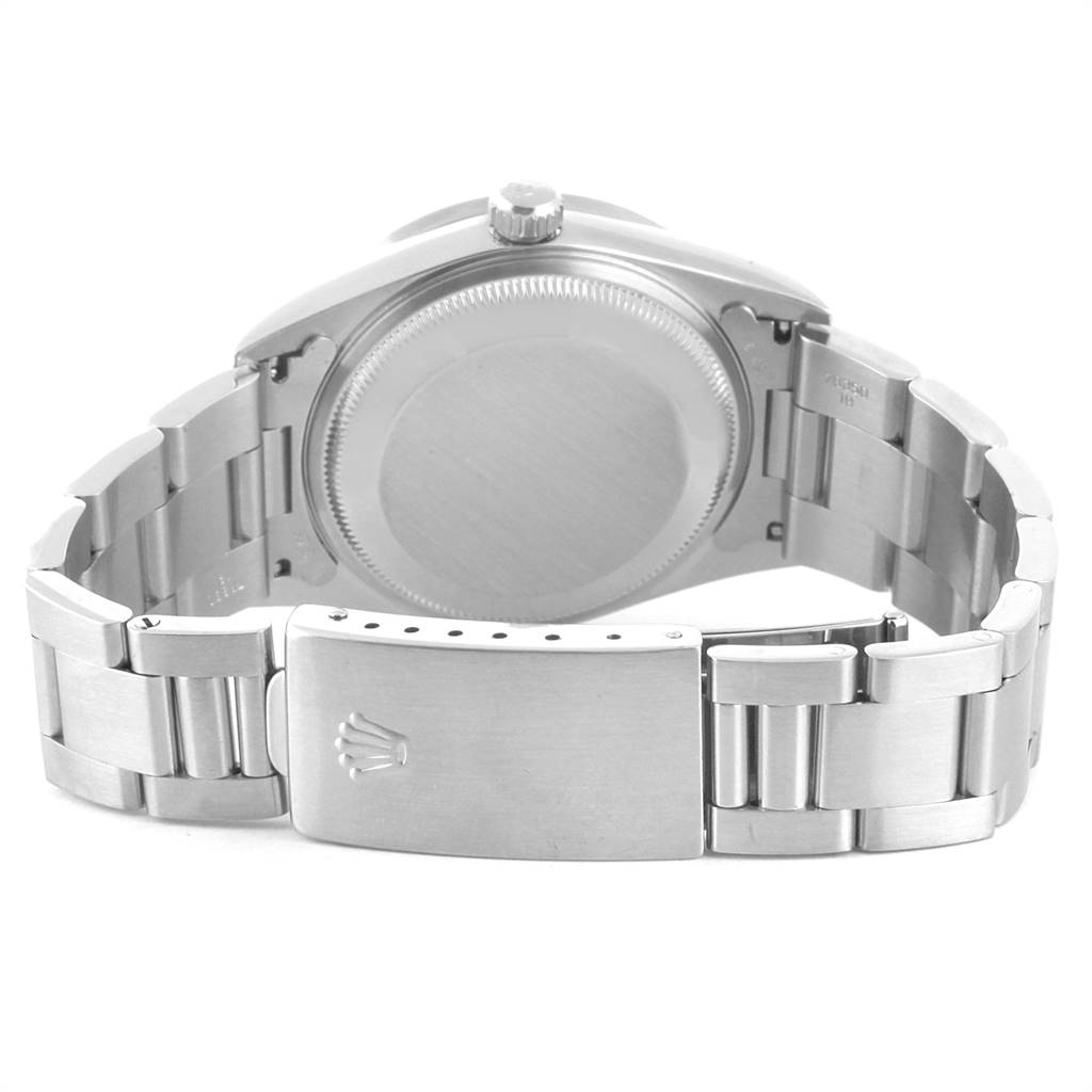 The image shows the back case and bracelet clasp of a Rolex Date 15210 Men's Stainless Steel Black Dial 15210 Men's Stainless Steel Black Dial model watch.