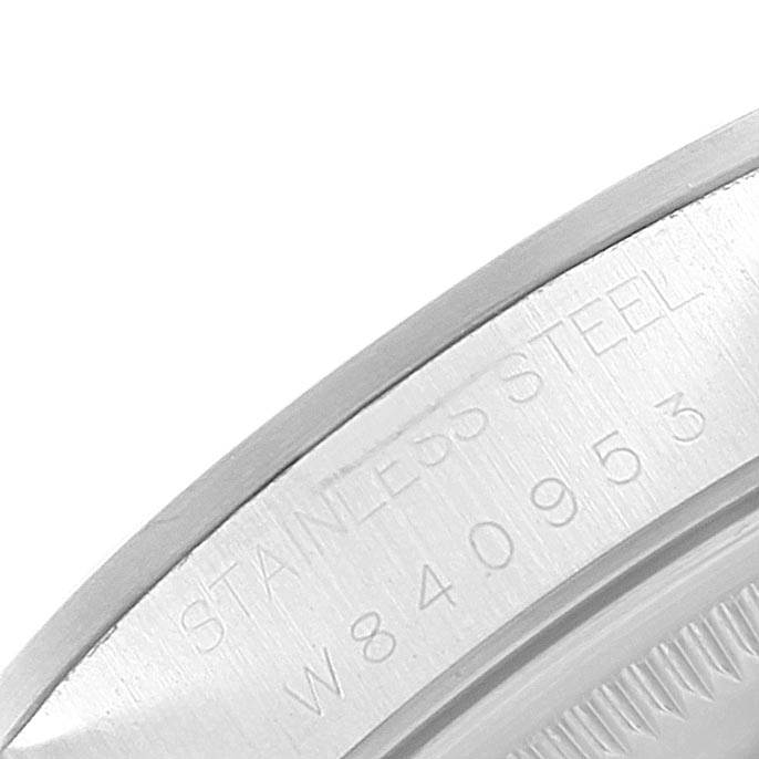 This is a close-up of the stainless steel casing and serial number on the edge of a Rolex Date 15200 Men's Stainless Steel Black Dial 15200 Men's Stainless Steel Black Dial model watch.