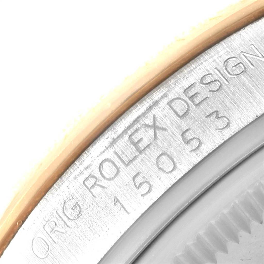 The image shows a close-up of the case back and serial number engraving on a Rolex Date 15053 Men's Steel and Gold (two tone) Champagne Dial 15053 Men's Steel and Gold (two tone) Champagne Dial watch.