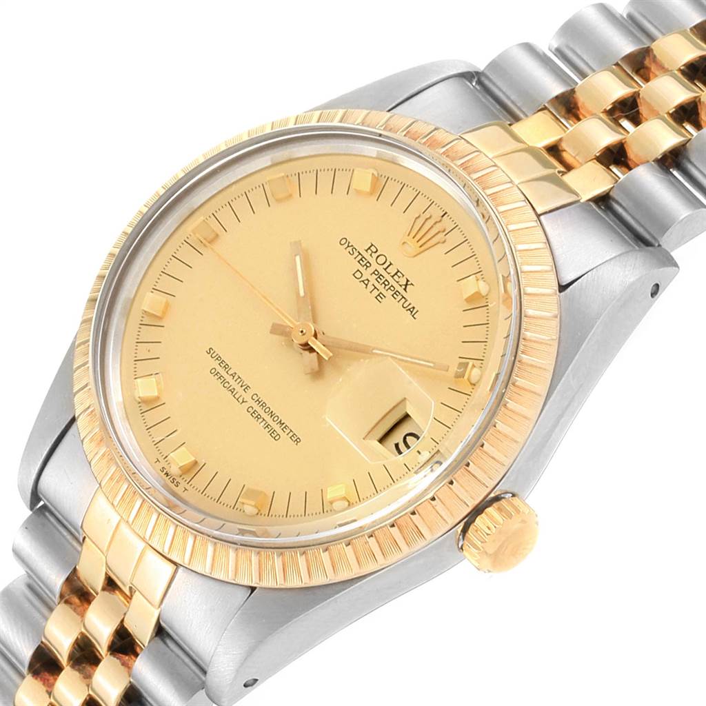 The image shows a close-up angled view of a Rolex Oyster Perpetual Date watch displaying its dial, bezel, case, band, and crown.