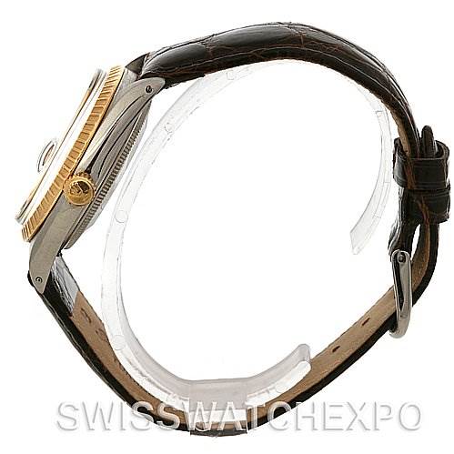 The image shows a side view of a Rolex Date 15035 Men's Stainless Steel Silver Dial 15035 Men's Stainless Steel Silver Dial watch, highlighting its case, bezel, crown, and leather strap.