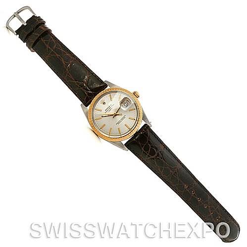 This image shows a Rolex Date 15035 Men's Stainless Steel Silver Dial 15035 Men's Stainless Steel Silver Dial watch, taken from a top view angle, displaying its face and the entire black leather strap.