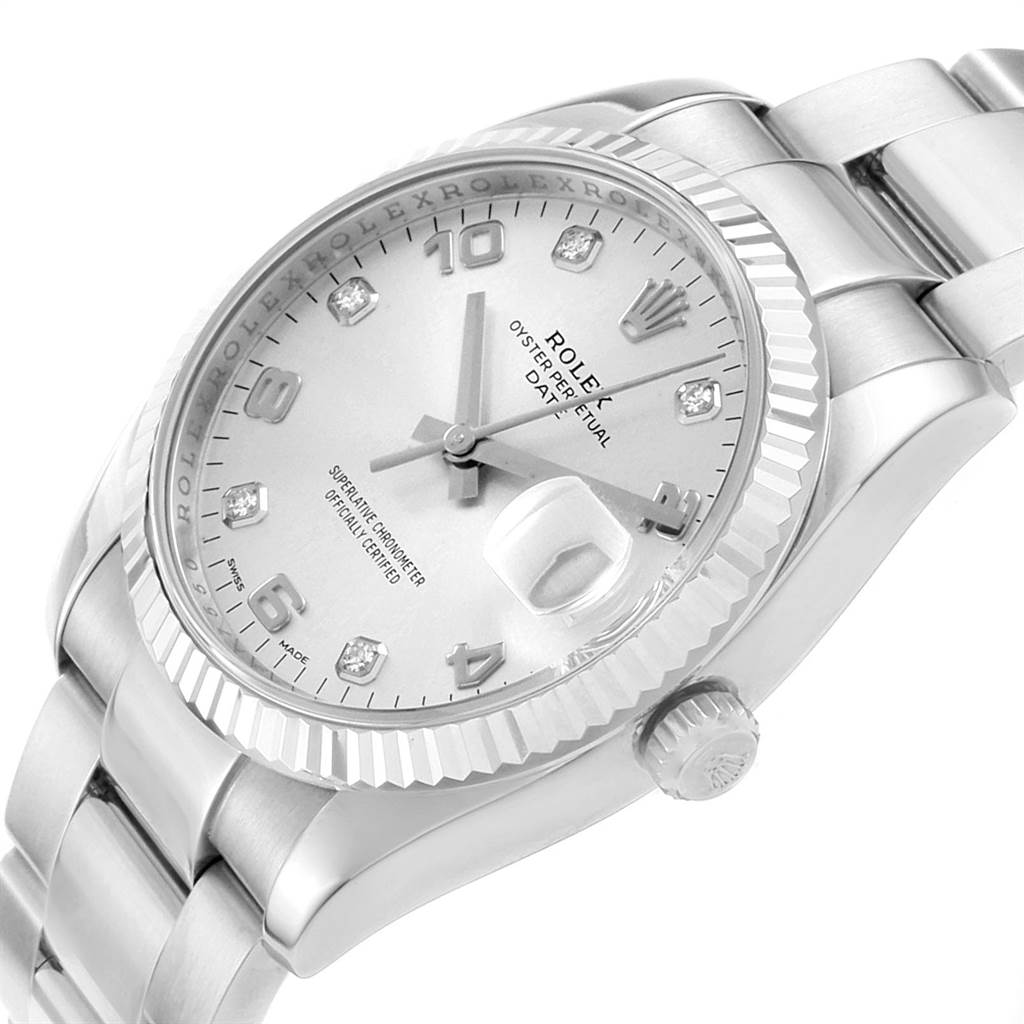 The image shows a close-up, angled view of the Rolex Date 115234 Men's Stainless Steel Silver Dial 115234 Men's Stainless Steel Silver Dial model watch, highlighting its dial, bezel, crown, and bracelet.