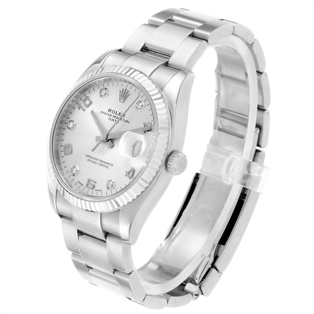 The image shows a side angle of a Rolex Date 115234 Men's Stainless Steel Silver Dial 115234 Men's Stainless Steel Silver Dial model watch, showcasing its dial, bracelet, and crown.