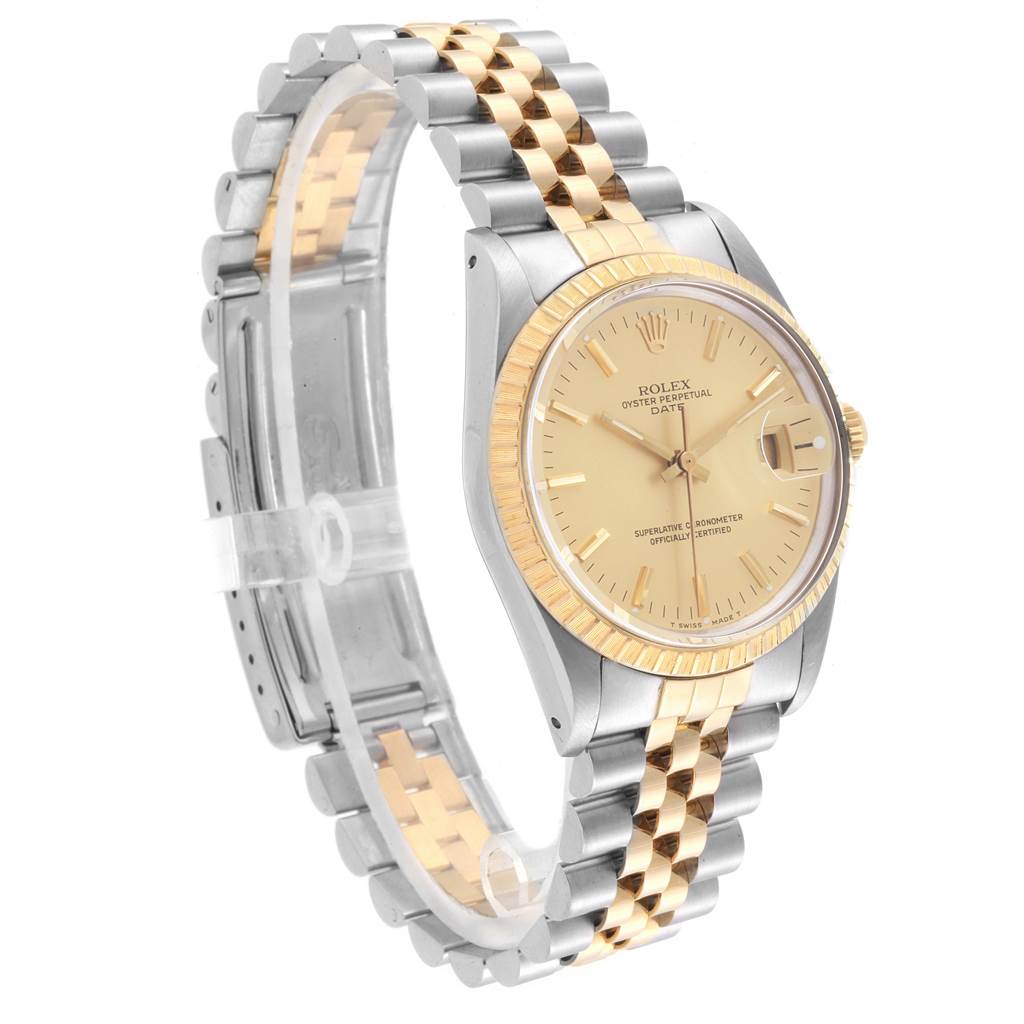 This image shows a Rolex Date 15053 Men's Steel and Gold (two tone) Champagne Dial 15053 Men's Steel and Gold (two tone) Champagne Dial watch with a two-tone bracelet (silver and gold) angled from the front and left side.