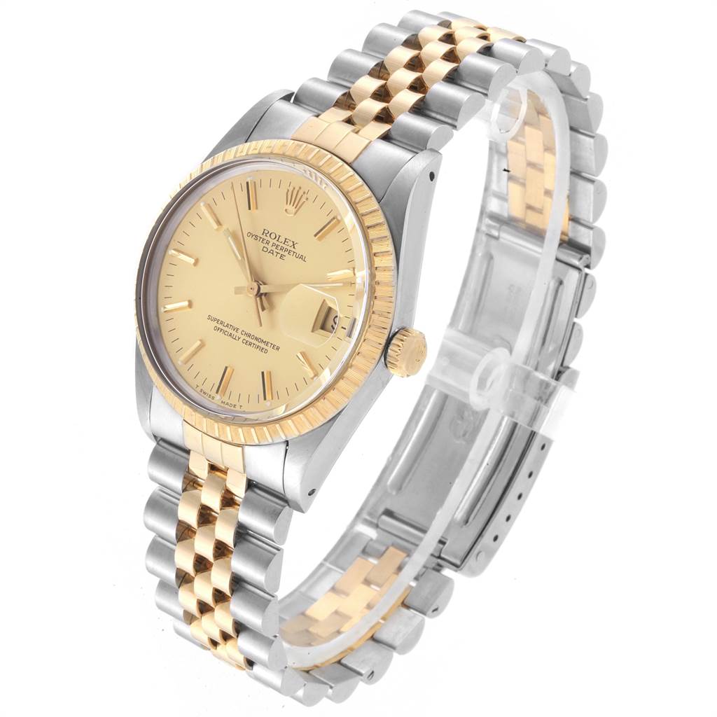 The image shows a side angle of a Rolex Date 15053 Men's Steel and Gold (two tone) Champagne Dial 15053 Men's Steel and Gold (two tone) Champagne Dial model watch, highlighting its gold and silver band, champagne dial, and fluted bezel.
