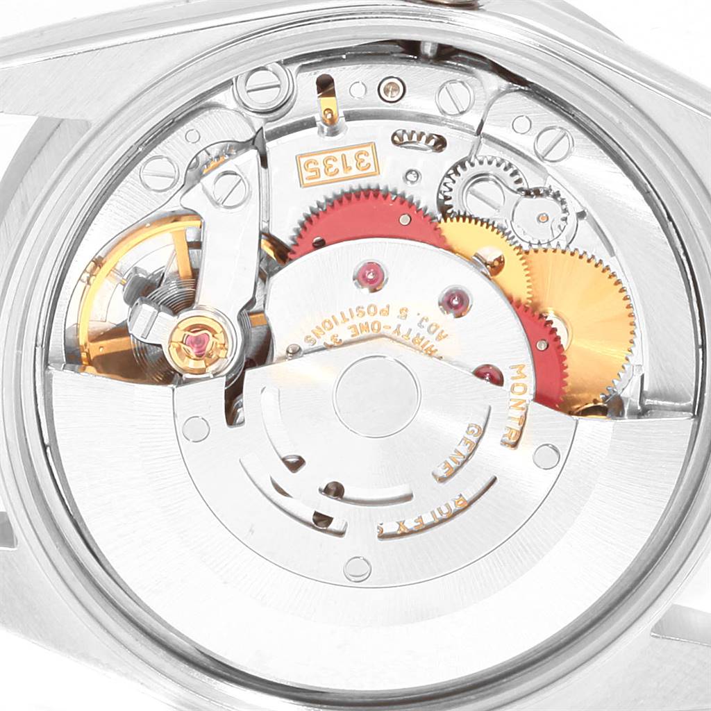 The image shows a close-up view of the movement mechanism inside a Rolex Date 15210 Men's Stainless Steel Silver Dial 15210 Men's Stainless Steel Silver Dial model watch.