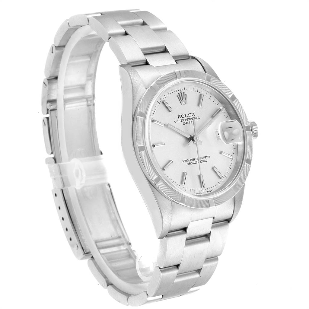 The image shows a Rolex Oyster Perpetual Date model, highlighting the face, bezel, and bracelet at a slight angle.