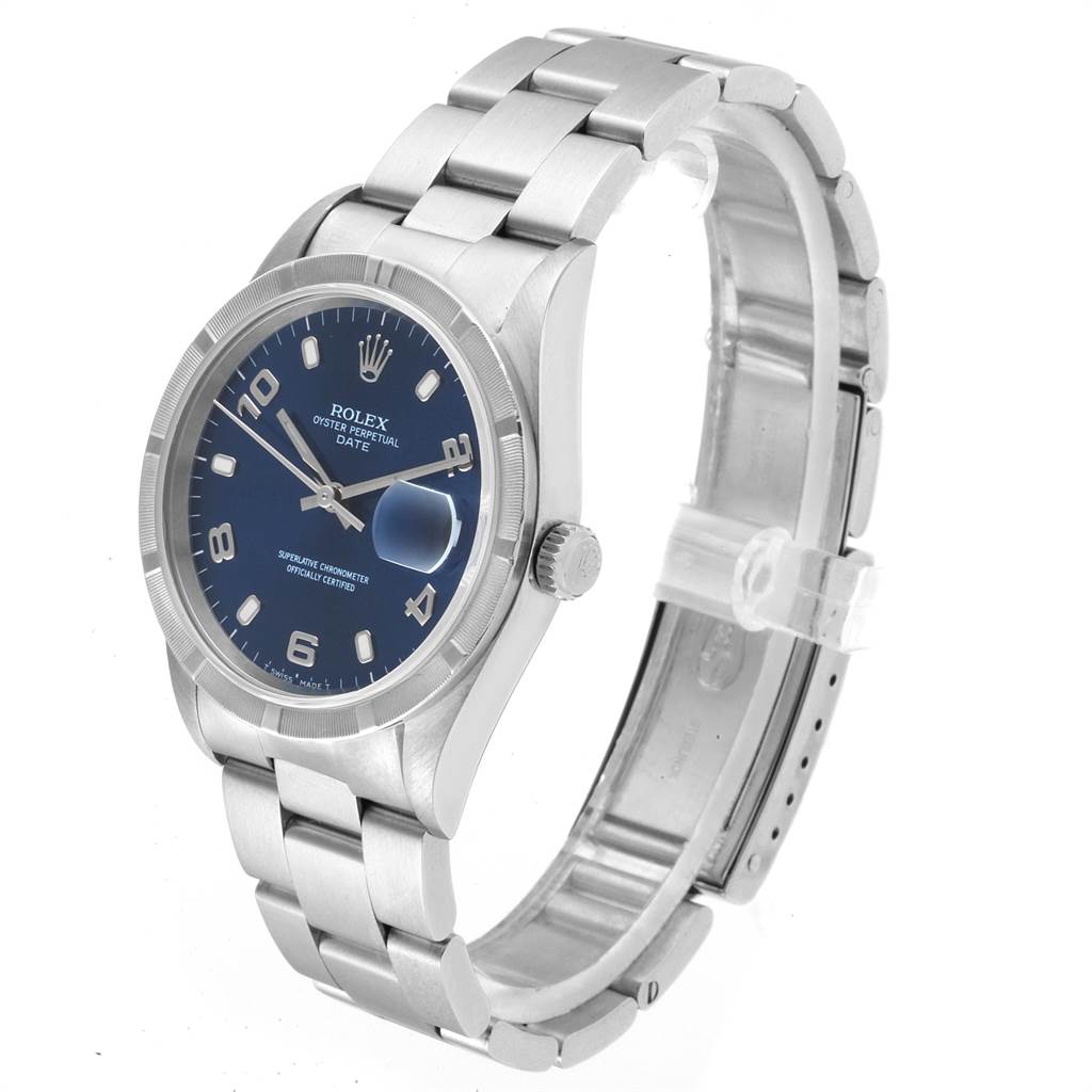 The image shows a Rolex Date 15210 Men's Stainless Steel Blue Dial 15210 Men's Stainless Steel Blue Dial model watch from an angled side view displaying the face, bezel, crown, and part of the bracelet.