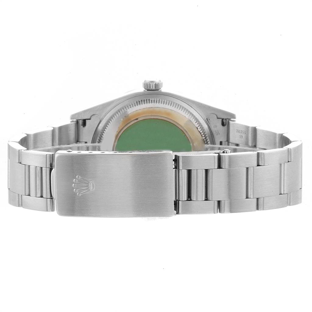 The image shows the back side of a Rolex Date 15210 Men's Stainless Steel Blue Dial 15210 Men's Stainless Steel Blue Dial model watch, highlighting the clasp and part of the stainless steel bracelet.