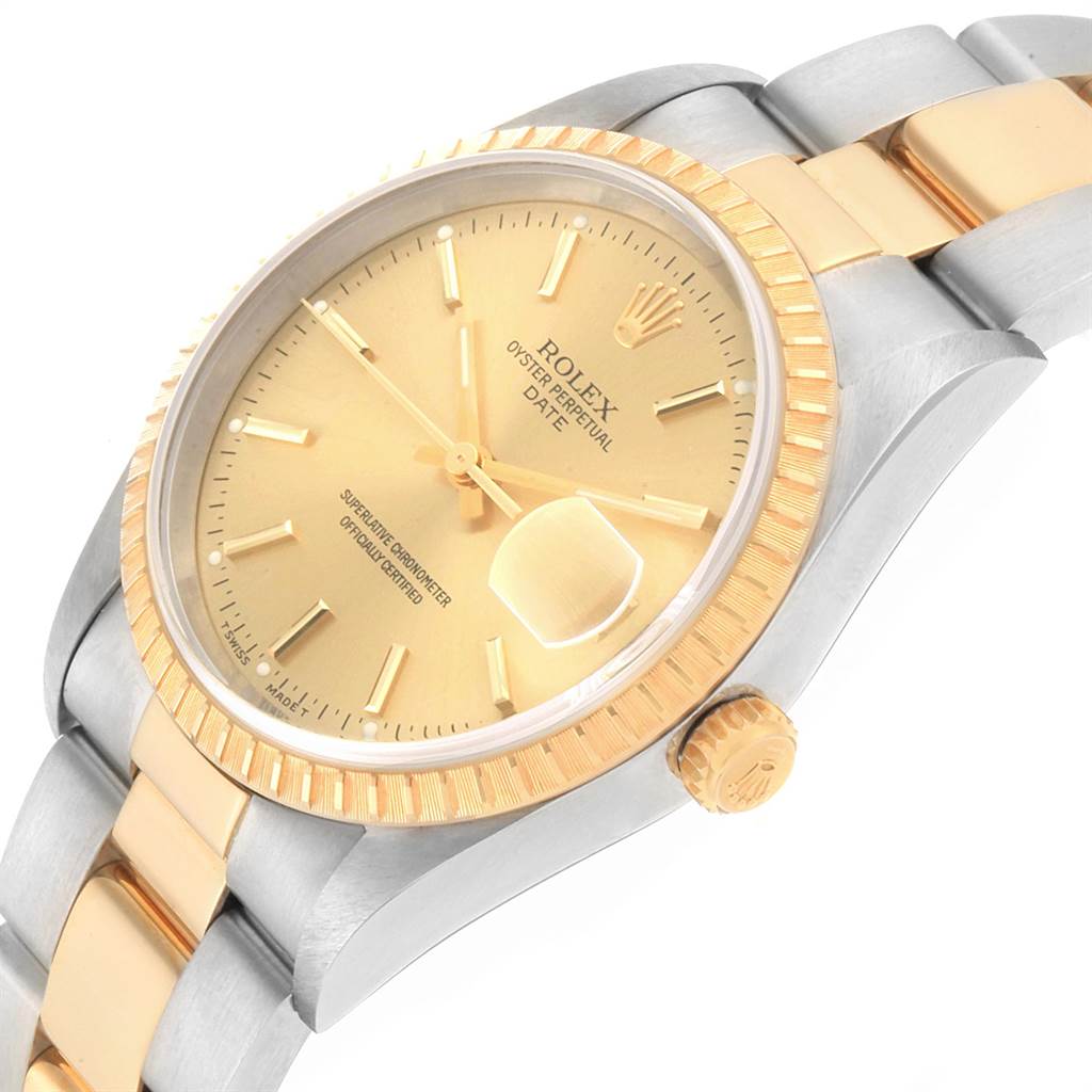 The image shows a Rolex Date 15223 Men's Steel and Gold (two tone) Champagne Dial 15223 Men's Steel and Gold (two tone) Champagne Dial model watch at an angled close-up, highlighting the dial, bezel, crown, and bracelet.