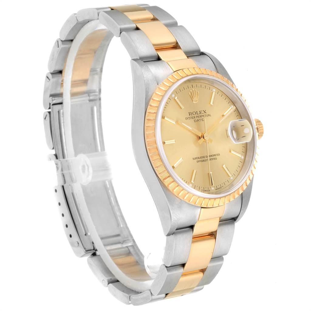 The Rolex Date 15223 Men's Steel and Gold (two tone) Champagne Dial 15223 Men's Steel and Gold (two tone) Champagne Dial model is shown at an angle highlighting the gold dial, date window, two-tone bracelet, and fluted bezel.