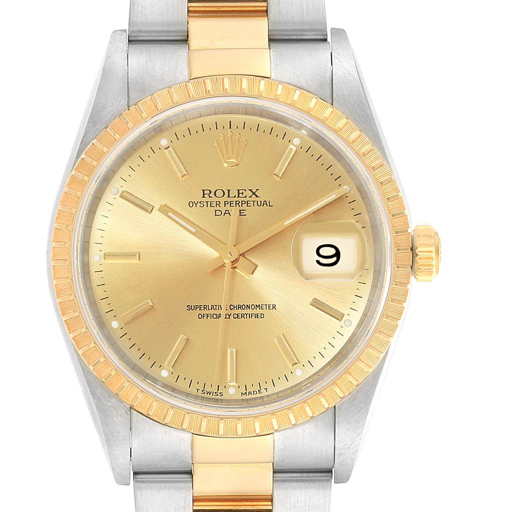 The image shows a close-up of the Rolex Date 15223 Men's Steel and Gold (two tone) Champagne Dial 15223 Men's Steel and Gold (two tone) Champagne Dial model's face and part of its two-tone band.