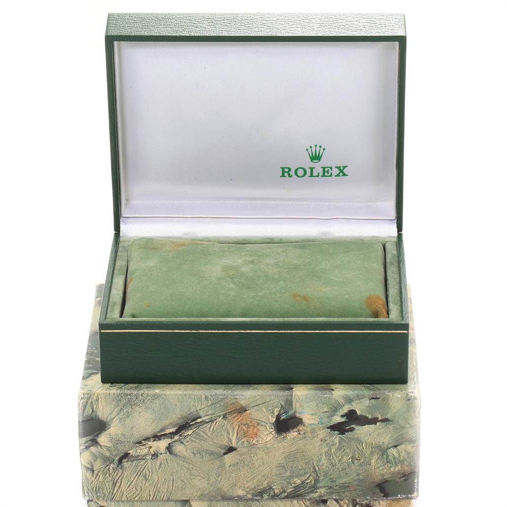 The image shows an open Rolex watch box, likely for a Date model.
