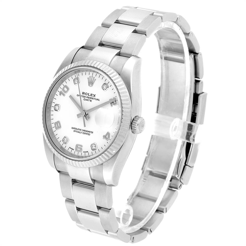 The image shows a Rolex Date 115234 Men's Stainless Steel White Dial 115234 Men's Stainless Steel White Dial model watch from an angle displaying its face, bracelet, and crown.